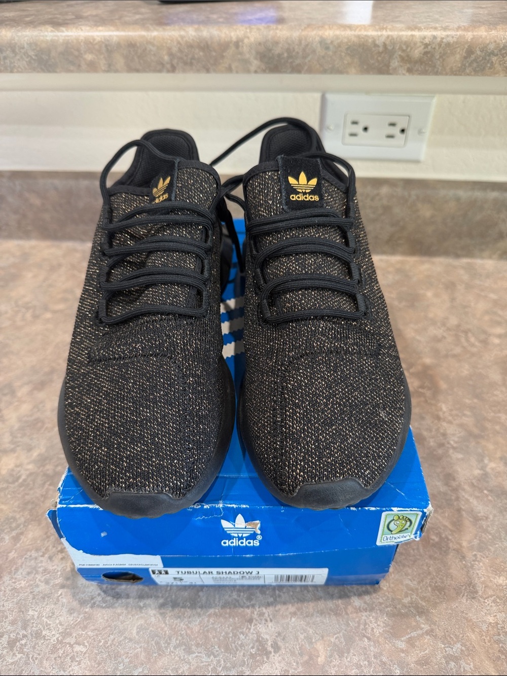 adidas Black Knit Sneakers with Gold Accents